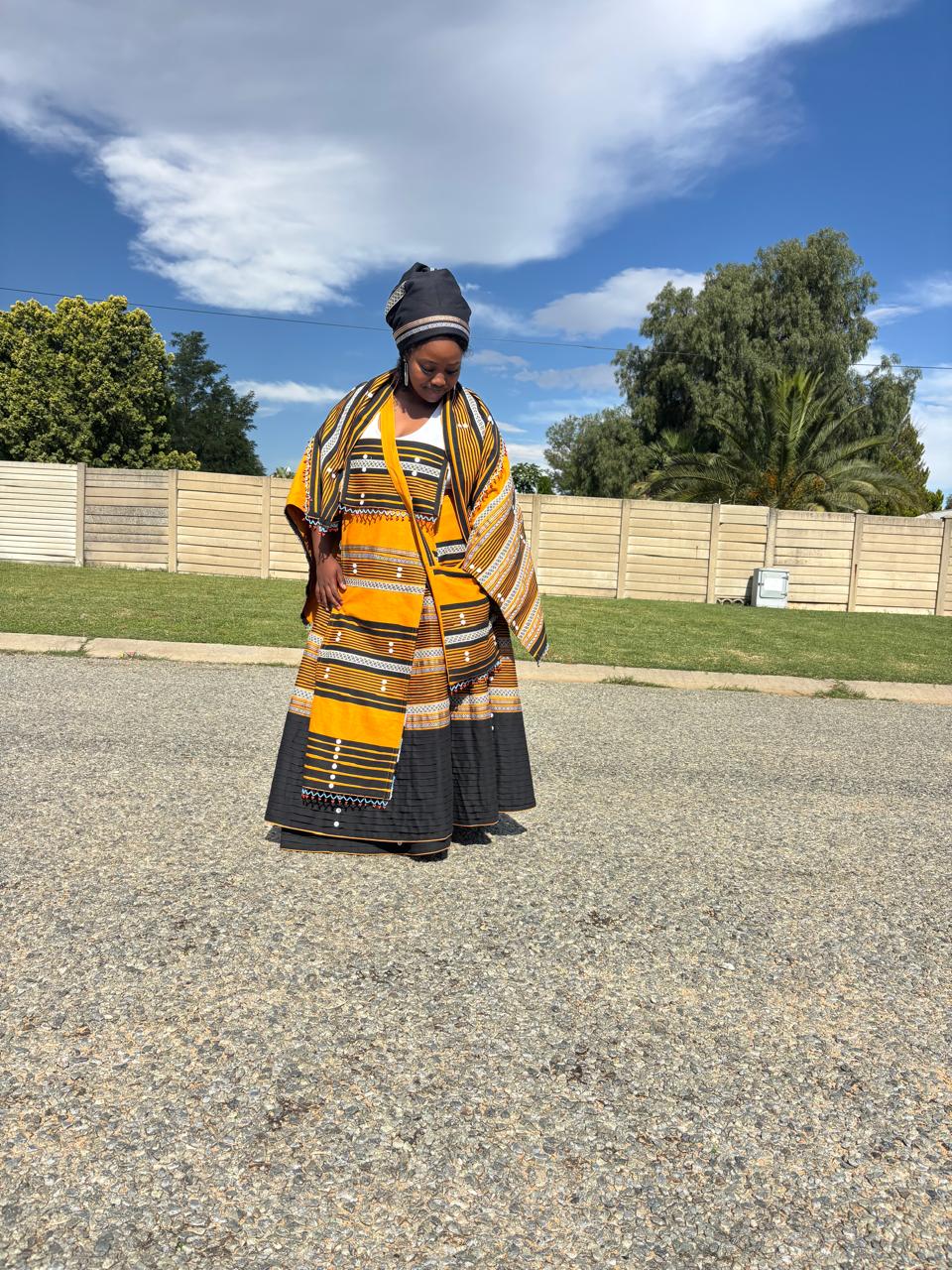 Yellow Xhosa traditional attire with beads